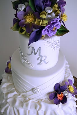 Huascar & Company Bakeshop White Wedding Cake with Sugar Flowers