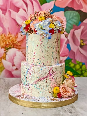 Huascar & Company Bakeshop Color Speckle Wedding Cake with Fresh Flowers