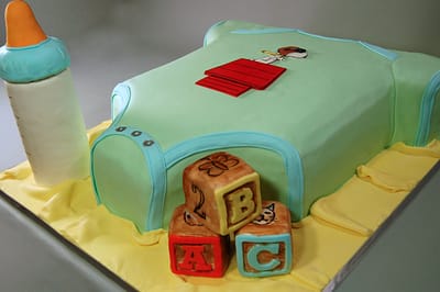 Huascar & Company Bakeshop Baby Shower Onesie Cake
